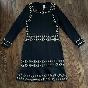 Michael Kors 
Black stretch mini dress with gold accents
Size: Large